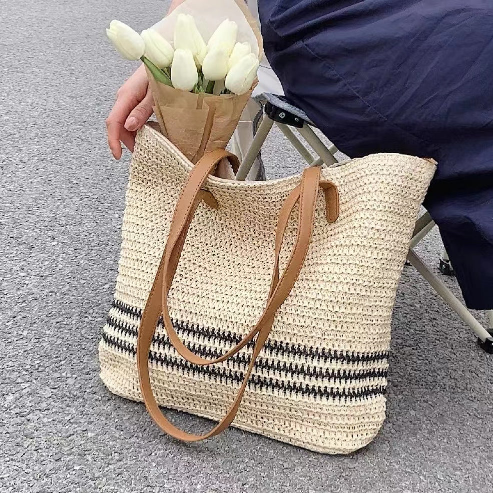 Borsa tote in paglia intrecciata beige